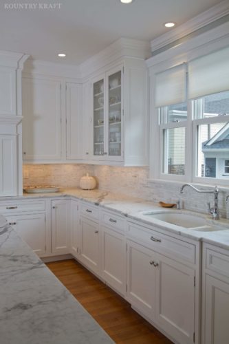 White painted traditional kitchen with marble countertops and sink North Haledon, NJ
