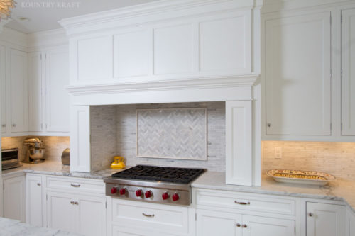 Custom cabinets and mantle wood hood with range top North Haledon, NJ