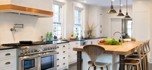 Custom White Cabinets for an Industrial Kitchen