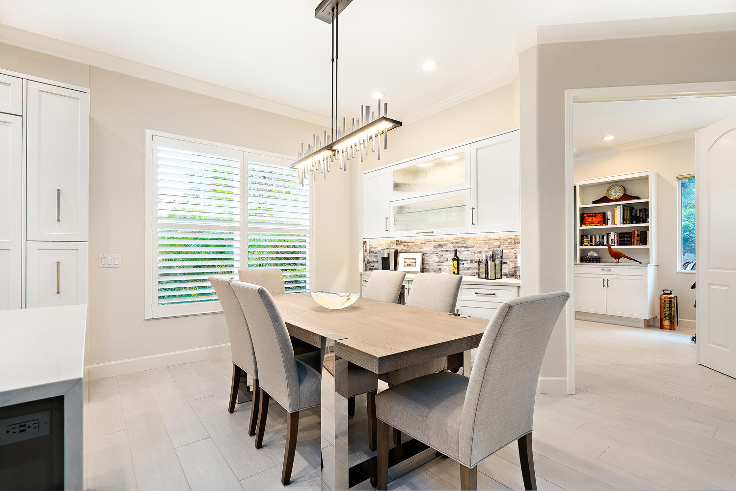 Wet Bar with Decorators White Cabinets in Venice, Florida