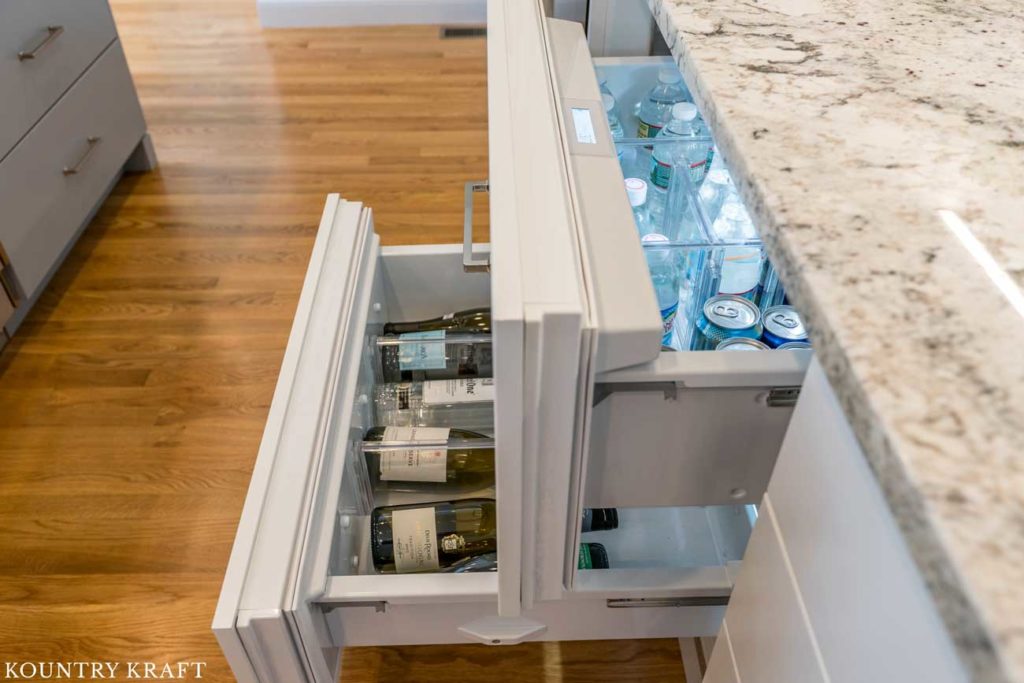 Refrigerator Drawers designed to match the decorators white cabinetry throughout the rest of this kitchen
