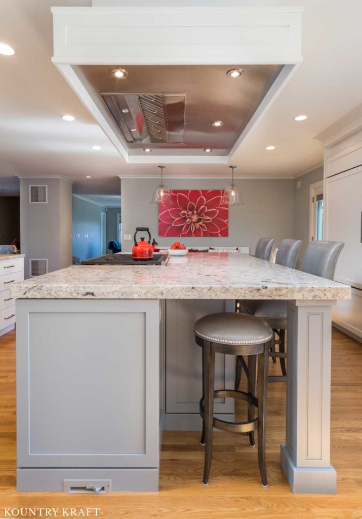 Shadow Gray Kitchen Island Cabinets provides bar seating in Marblehead, Massachusetts