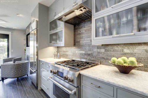 trout design studio designed this transitional gray kitchen