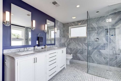 transitional bathroom design by trout design studio with kountry kraft cabinetry
