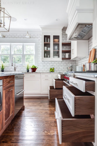a designers dream kitchen must include deep drawers with their custom cabinetry
