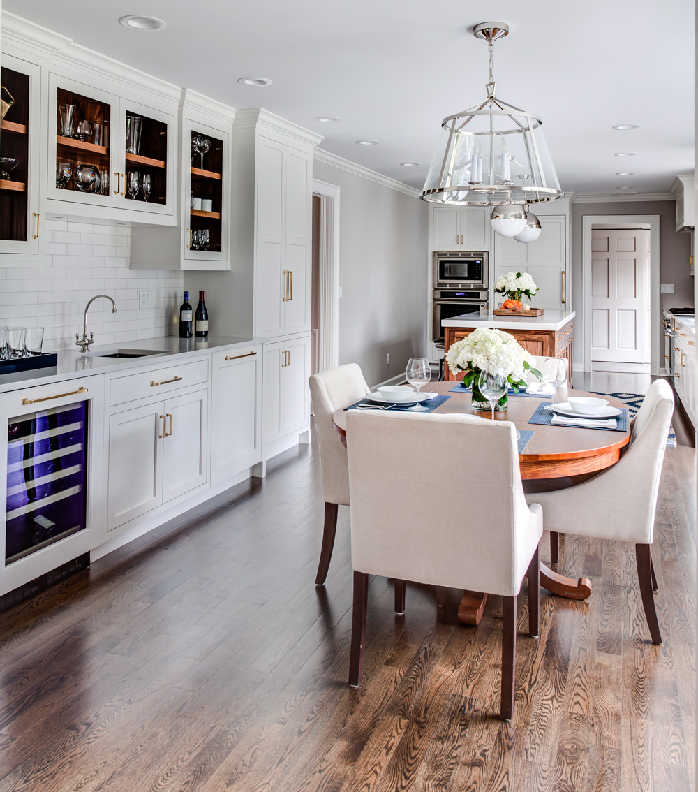 Dining Room Storage Cabinets take the form of a wet bar with a wine fridge and prep sink