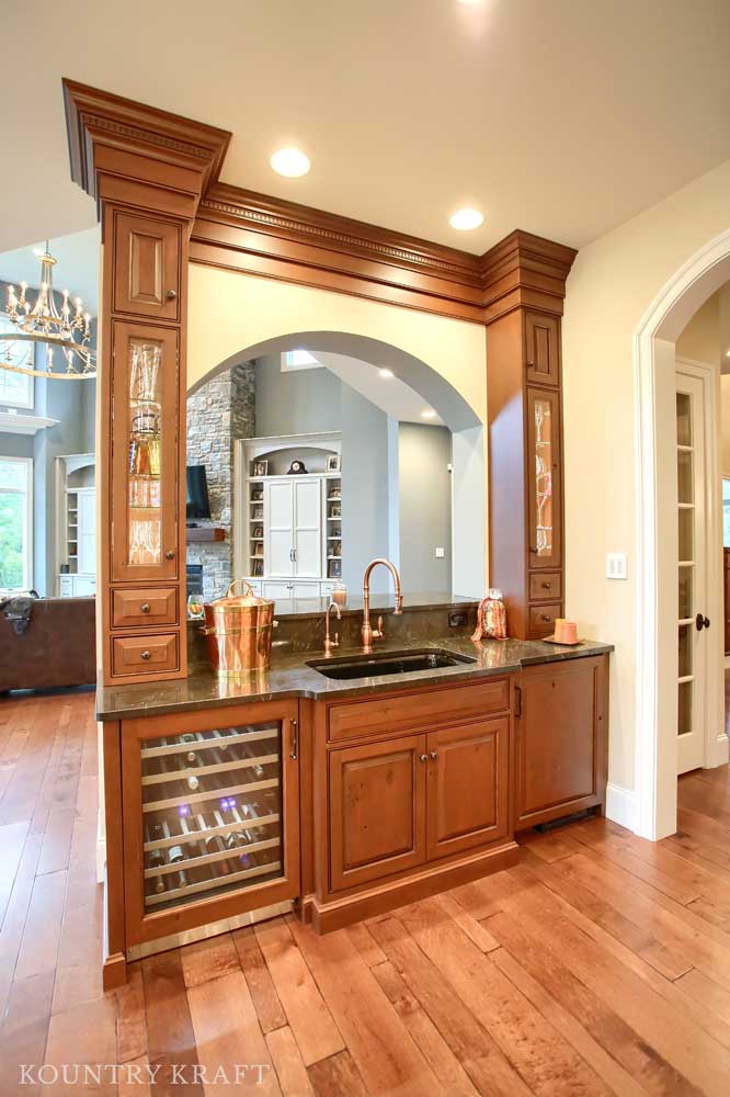 Custom Rustic Cherry Wet Bar Cabinetry includes a Beverage Refrigerator in Mohnton, PA