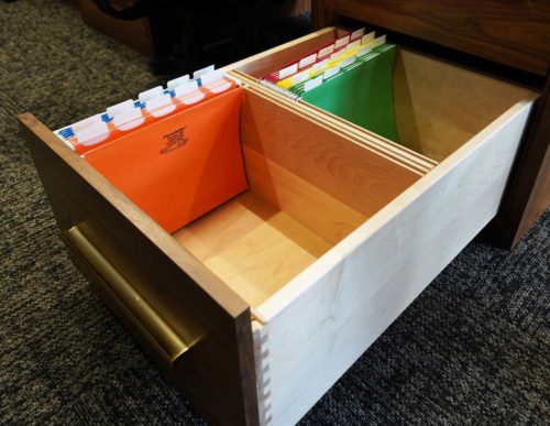 Custom cabinetry folder drawer organizer in executive office