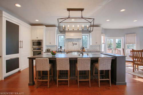 Extra White Kitchen Cabinets for an l-shaped farmhouse style kitchen in Sinking Spring, Pennsylvania