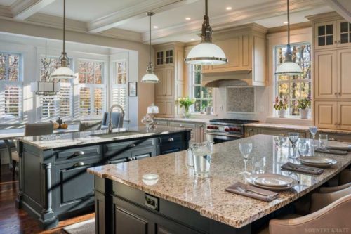 Kitchen featuring two islands, range, and French Beret Cabinets Bryn Mawr, PA
