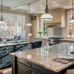 Kitchen featuring two islands, range, and French Beret Cabinets Bryn Mawr, PA