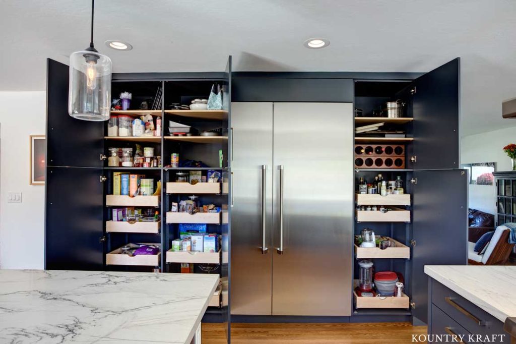 Large Kitchen Pantry Crafted with Custom French Beret Cabinets to Create Optimal Food Storage 