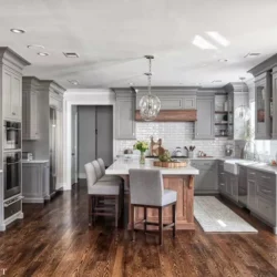 Gray Kitchen Cabinets were Used to Create this L Shaped Kitchen for a Home