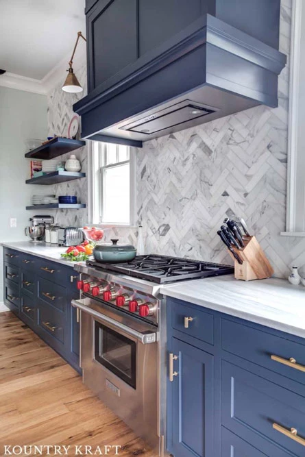 Hale navy kitchen cabinets with range between two counters Bay Head, NJ