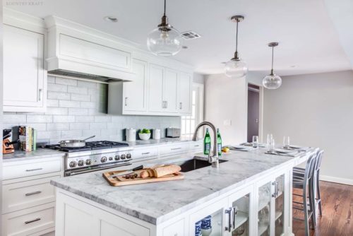 White inset cabinets, range, island, and chairs Madison, NJ