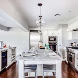 Kitchen with hard maple cabinets, island, and two counters Madison, NJ