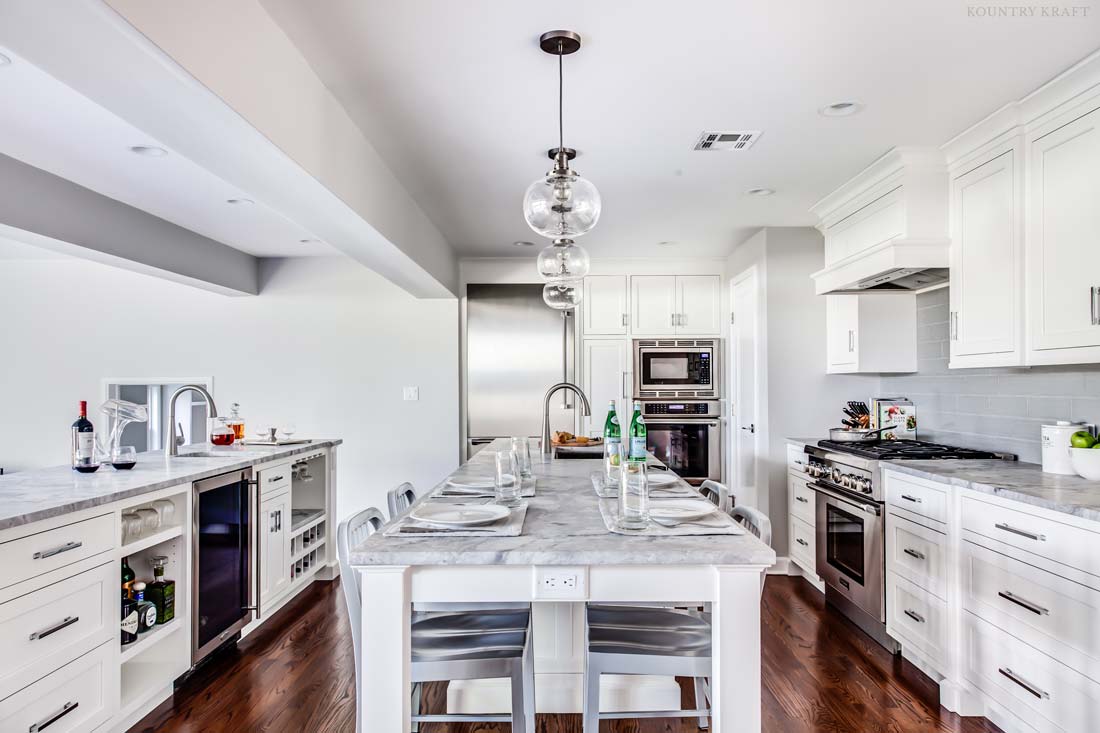 Kitchen with hard maple cabinets, island, and two counters Madison, NJ