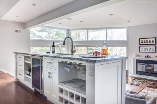 Kitchen island with wine cooler, wine bottle and glass storage, and shelves Madison, NJ