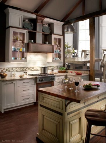 Kitchen with hard maple cabinets, island, and range Orlando, Fl