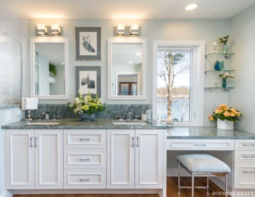 This Bathroom Features Custom White Bath Cabinets With A Makeup Station To Match The Vanity 