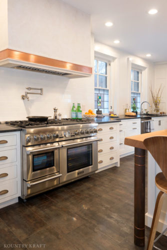 Kitchen with hard maple cabinets and range Pittsburgh, PA