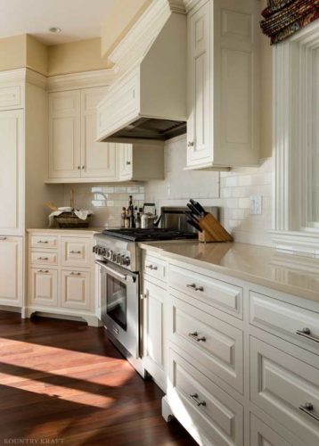 Countertop, range with range hood, and kitchen cabinet Cape Neddick, ME