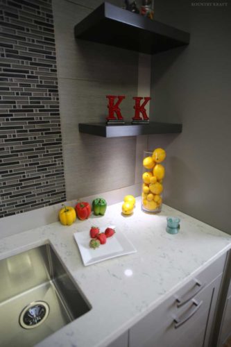 Counter space next to sink with shelves above and drawers below Birdsboro, PA