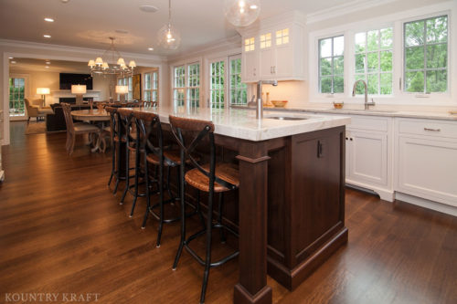 Kitchen cabinet and island with English Walnut stain and seating space Madison, NJ