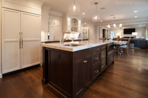 White Dove cabinets and island with English Walnut stain and built in sink Madison, NJ