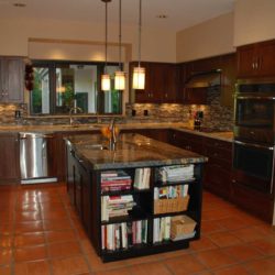 Kitchen cabinets, island with book shelves, oven, and refrigerator Alexandria, VA