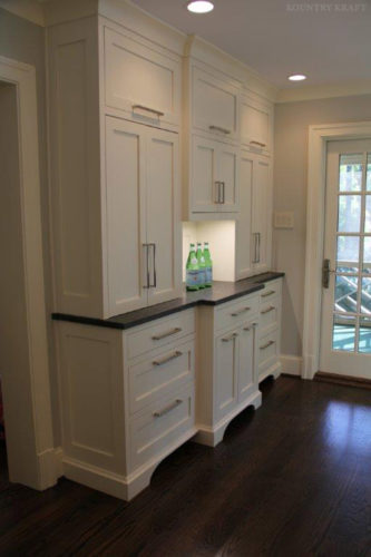 White kitchen cabinets with under cabinet lighting Bethesda, MD