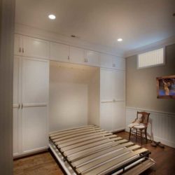 White cabinets open Murphy bed Bethesda, MD