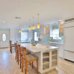 Kitchen with two islands which double as tables with chairs Venice, FL