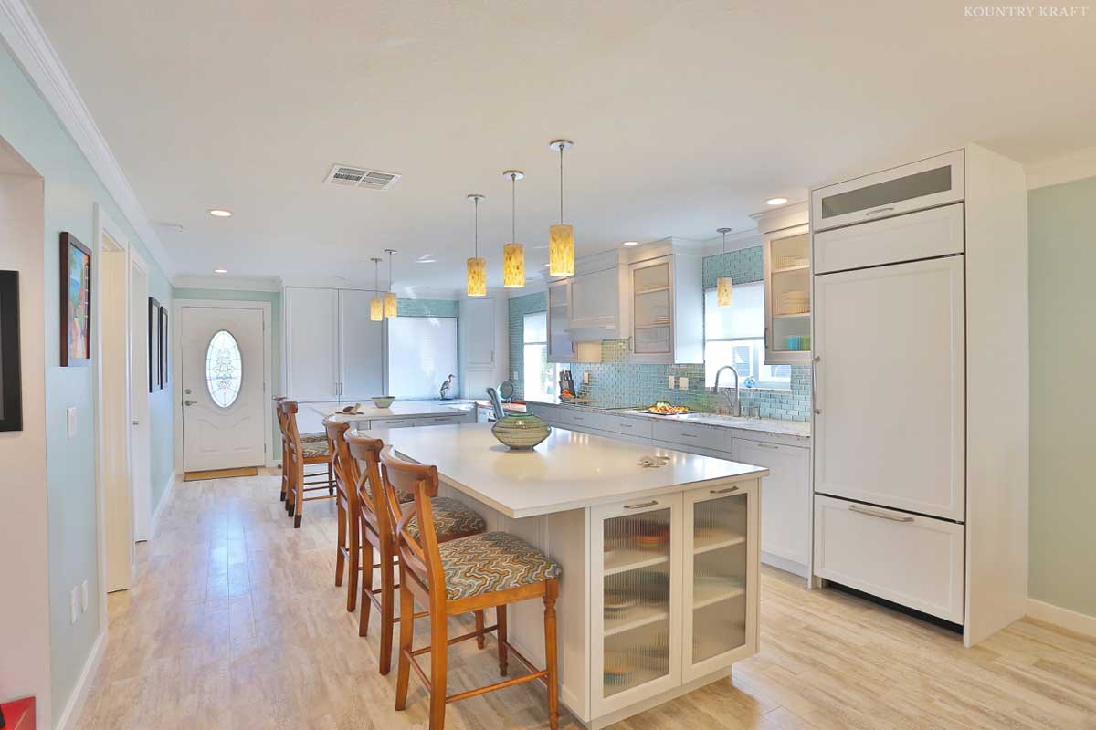 Kitchen with two islands which double as tables with chairs Venice, FL