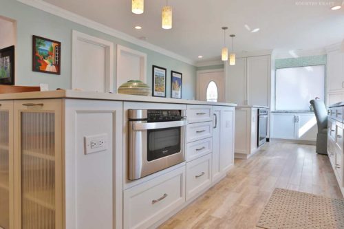 Transitional Kitchen with Electrical Outlets Incorporated into the Kitchen Island Designed for Easy Accessibility for Appliances