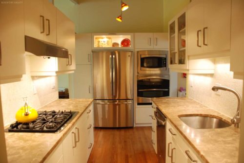 Small kitchen cabinets, counters with stove top and sink, refrigerator, oven, and microwave Alexandria, VA