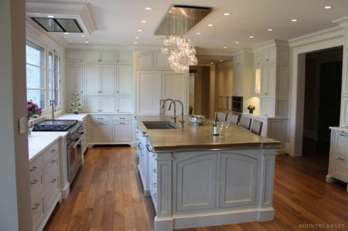 White cabinets and kitchen island with built in sink Alexandria, VA