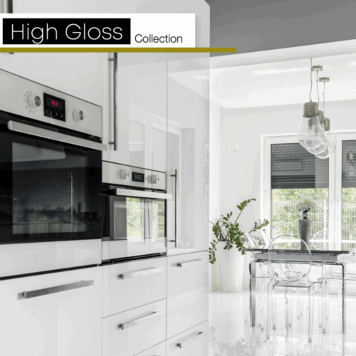 A white kitchen with high gloss cabinetry by Kountry Kraft Cabinetry.