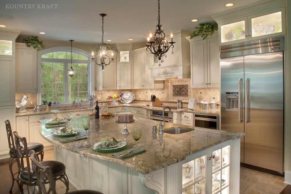 Large kitchen island with a built-in undermount sink and three chairs Enola, PA