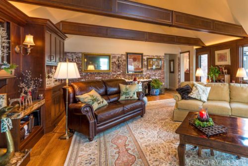 Custom Built-in Cabinets for a living room in Winchester, Massachusetts feature a Hazel stain color