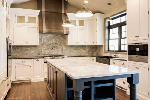 Luxury kitchen cabinets, beautiful range hood, and island Mohnton, PA