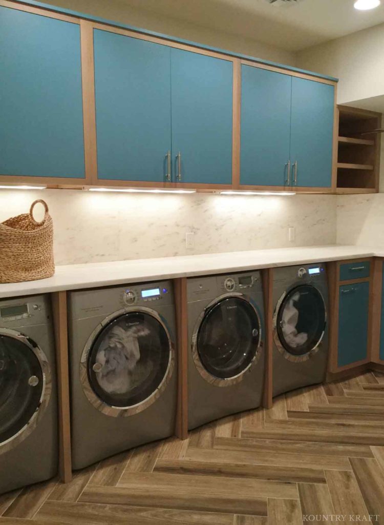 Laundry room cabinets pained manitou blue with shelves Greenwich, CT