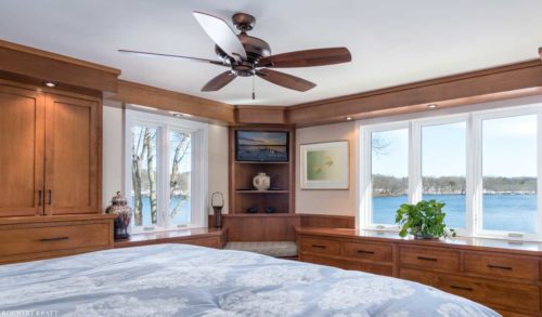 Master Bedroom Cabinets in Winchester, Massachusetts feature shelving and storage space for clothing and other personal items