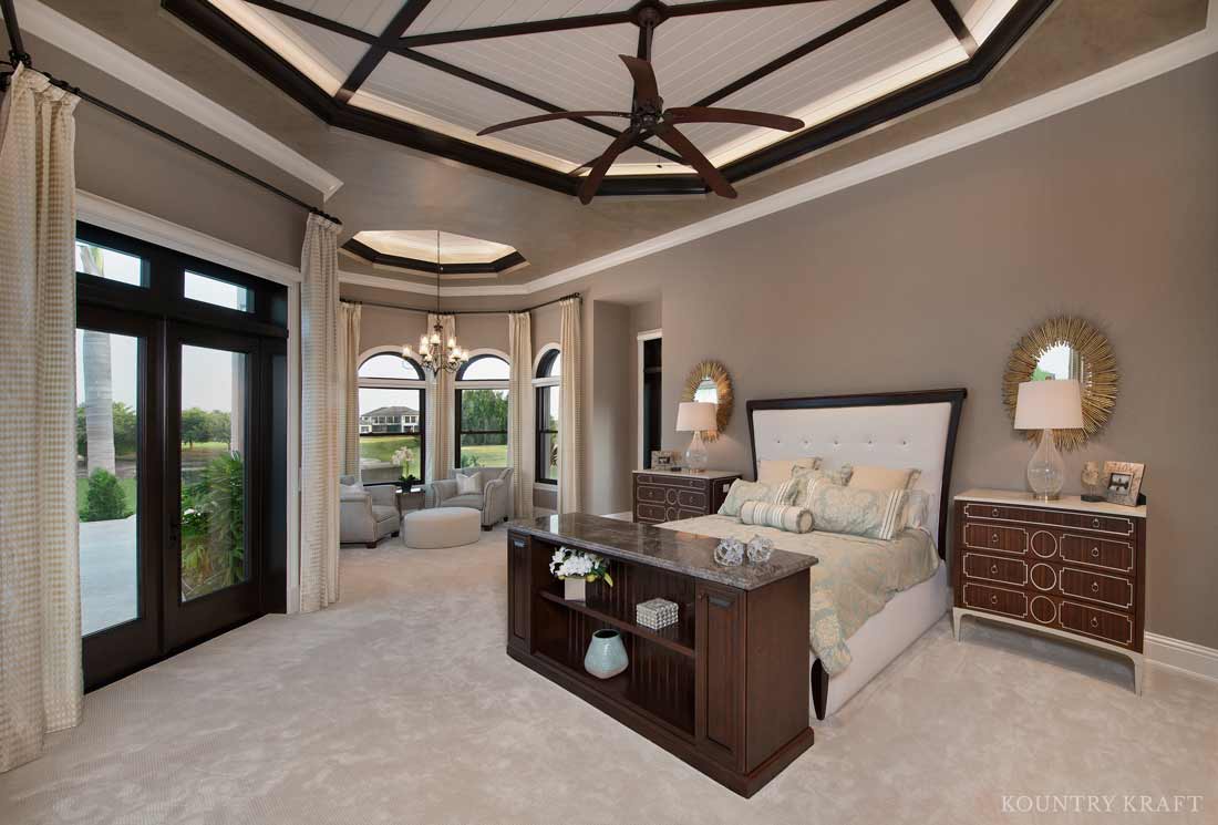 Master bedroom featuring cabinetry which conceals a television Naples, FL