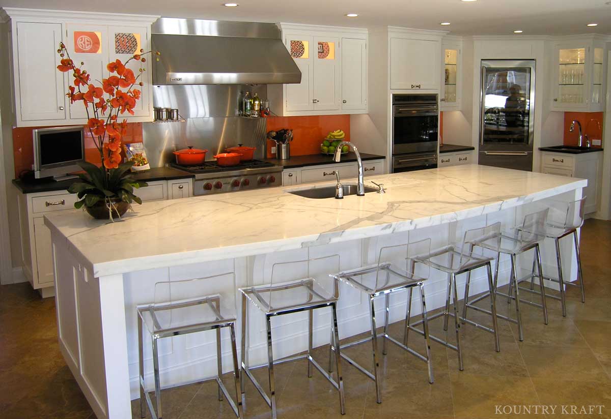 Modern kitchen with long island fitting six seats and built in sink Darien, CT