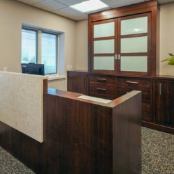 Office reception island desk with waterfall accent