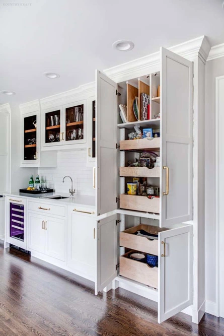 Custom wet bar pantry with pull out drawers in Summit, New Jersey