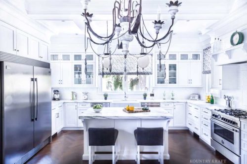 Pure White Kitchen Cabinets with custom moldings throughout for a kitchen in Glen Ridge, NJ