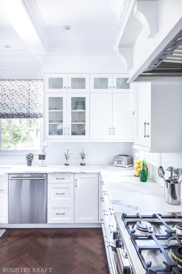 Custom white painted cabinets for a u-shaped kitchen in a historic home in Glen Ridge, NJ