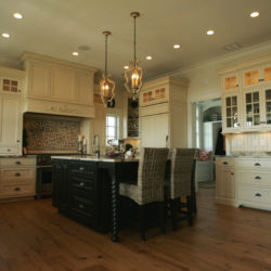 Shaker cabinets, black island with spiral legs, and seating Old Saybrook, CT